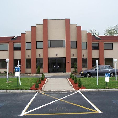 Budget Inn & Suites Wall Exterior photo