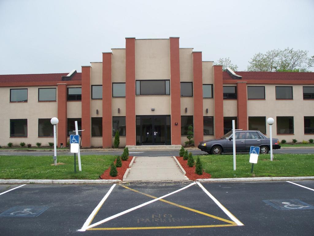 Budget Inn & Suites Wall Exterior photo